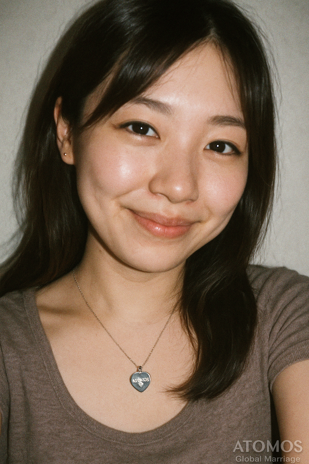 Japanese girl looking at you with smile