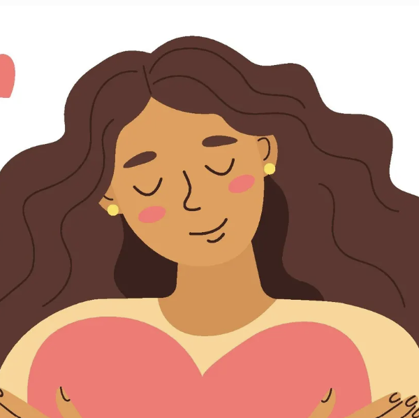 A woma holding a pink heart with smiling face