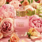 Woman perfume with a lot of flowers as a background